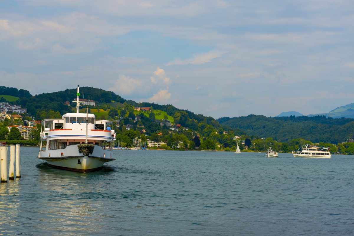 A touristic ship sailing in the sea near Switzerland